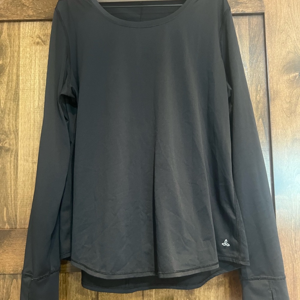Black Prana woman’s long sleeve scoop neck shirts. With thumb holes, size large